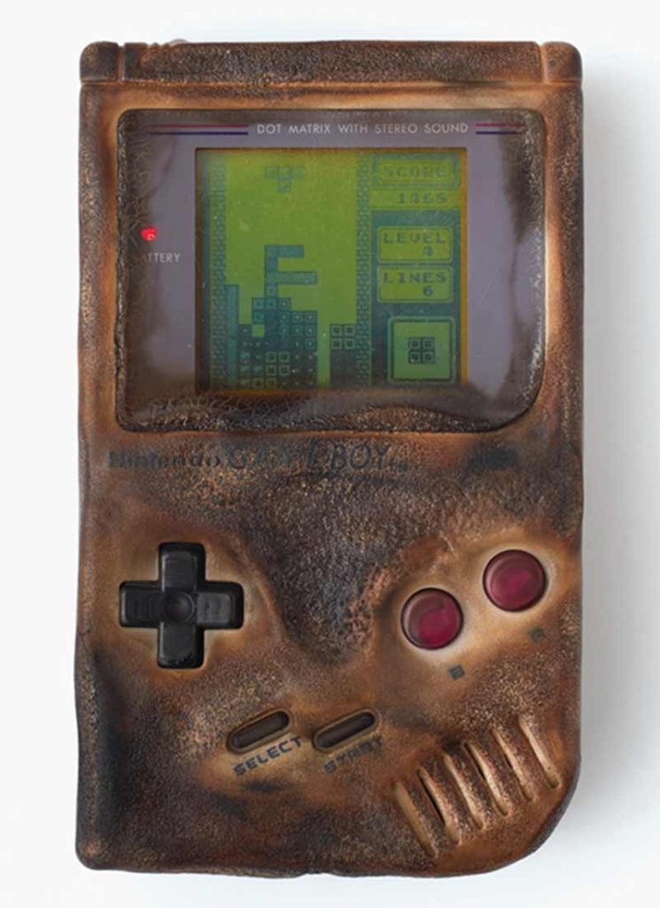 Old and rusty Gameboy images, capturing a vintage gaming aesthetic and worn-out electronics.