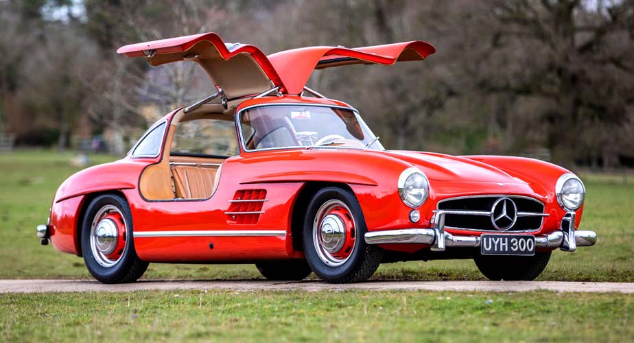 Mercedes-Benz 300SL showcasing its aerodynamic design and iconic gullwing doors, highlighting the innovative engineering that revolutionized automotive performance.