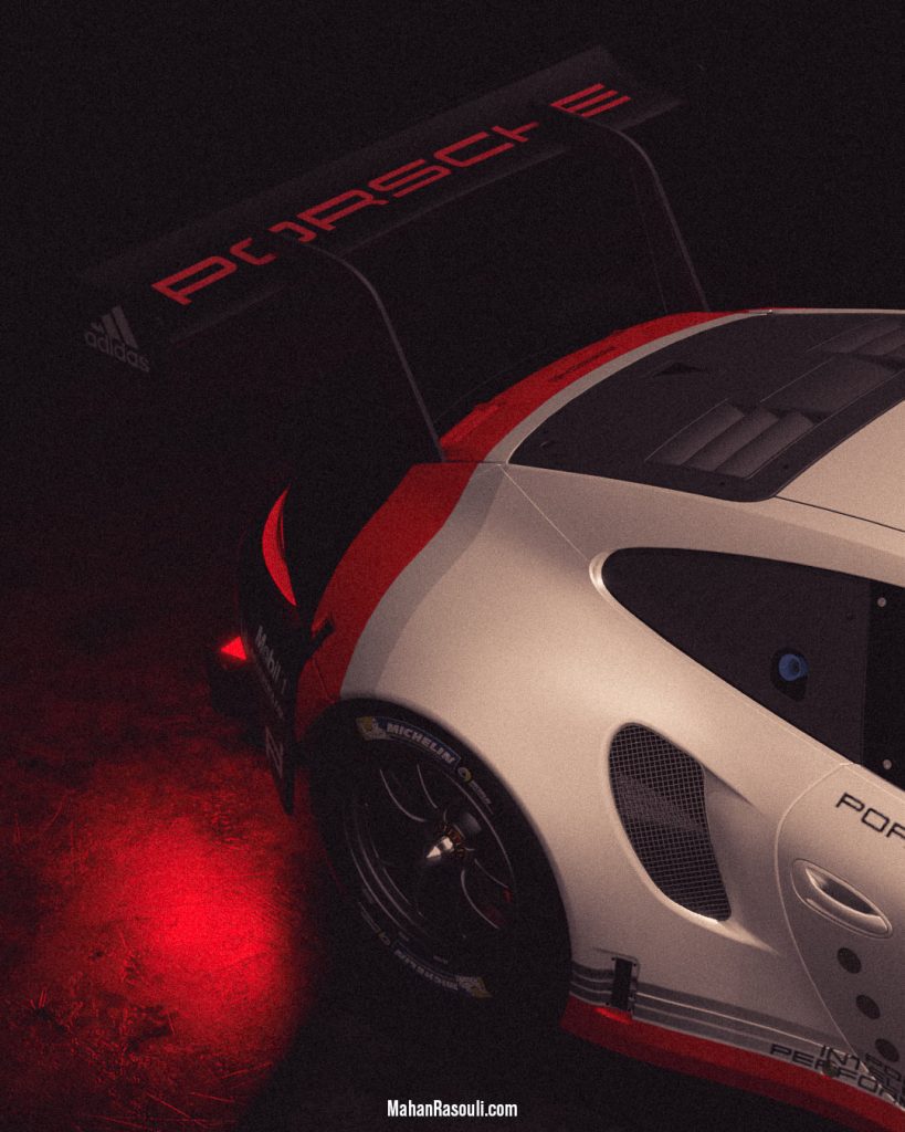 A dramatic 3D render of the Porsche 911 RSR, set in a dark, high-contrast environment to accentuate its aggressive racing design. Modeled and rendered in Blender 3D using Cycles.